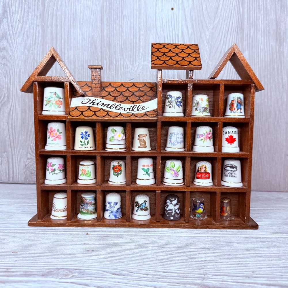 Vintage thimbleville trinket shelf with  glass and ceramic vintage 25 thimbles